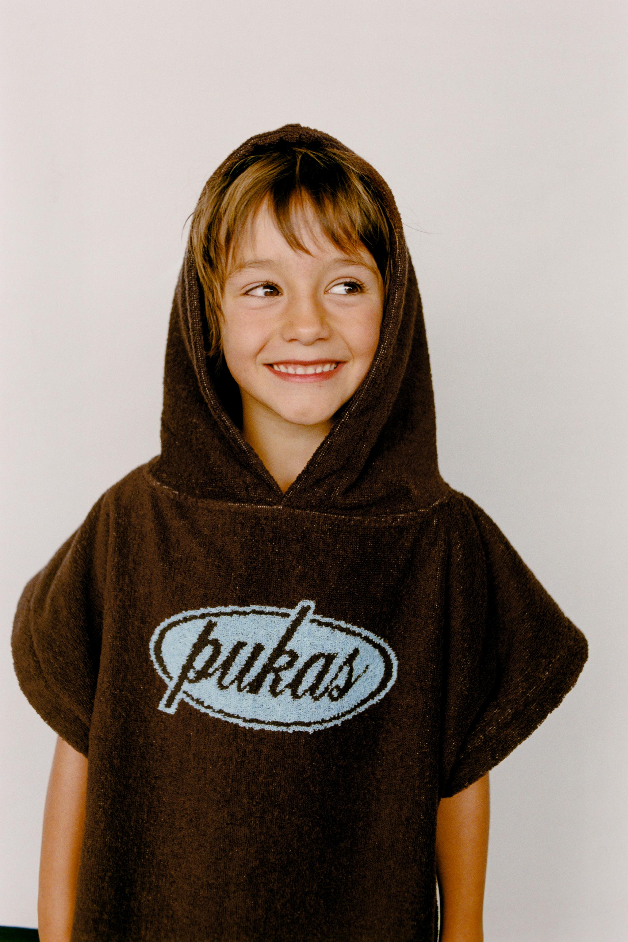 PUKAS SURF TERRYCLOTH PONCHO